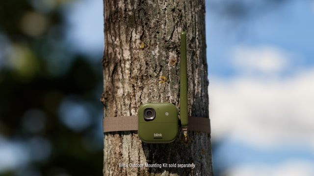 Green Blink Frontier XR+ camera mounted to a tree