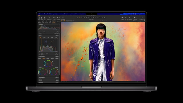 A current MacBook Pro viewed from the front with Capture One on its display