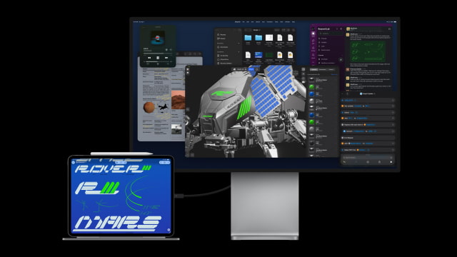 iPad Pro connected to an external display showing a design application