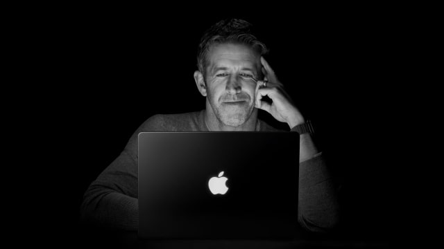 John Ternus seated behind a MacBook Pro in an Apple-supplied photograph for WIRED